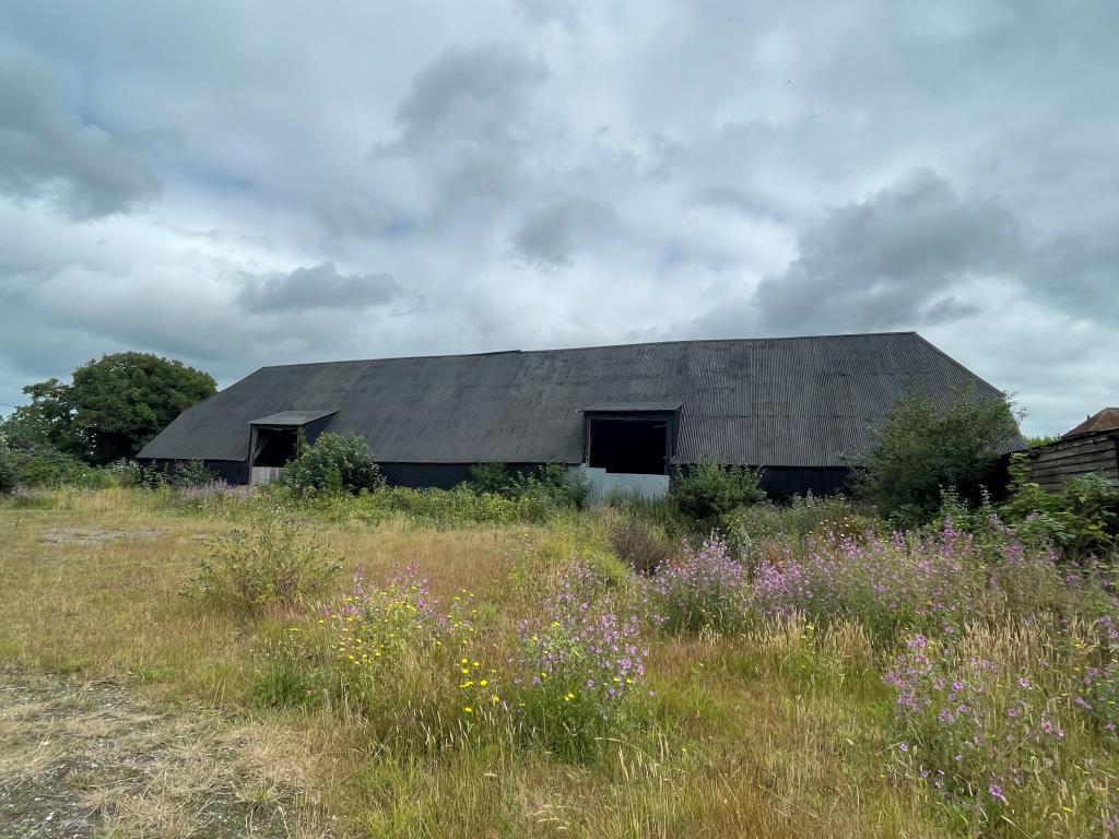 Lot: 158 - REDEVELOPMENT OPPORTUNITY - PLANNING CONSENT FOR TWO NEW BUILD DWELLINGS AND SEVEN BARN CONVERSIONS - Front of large barn
